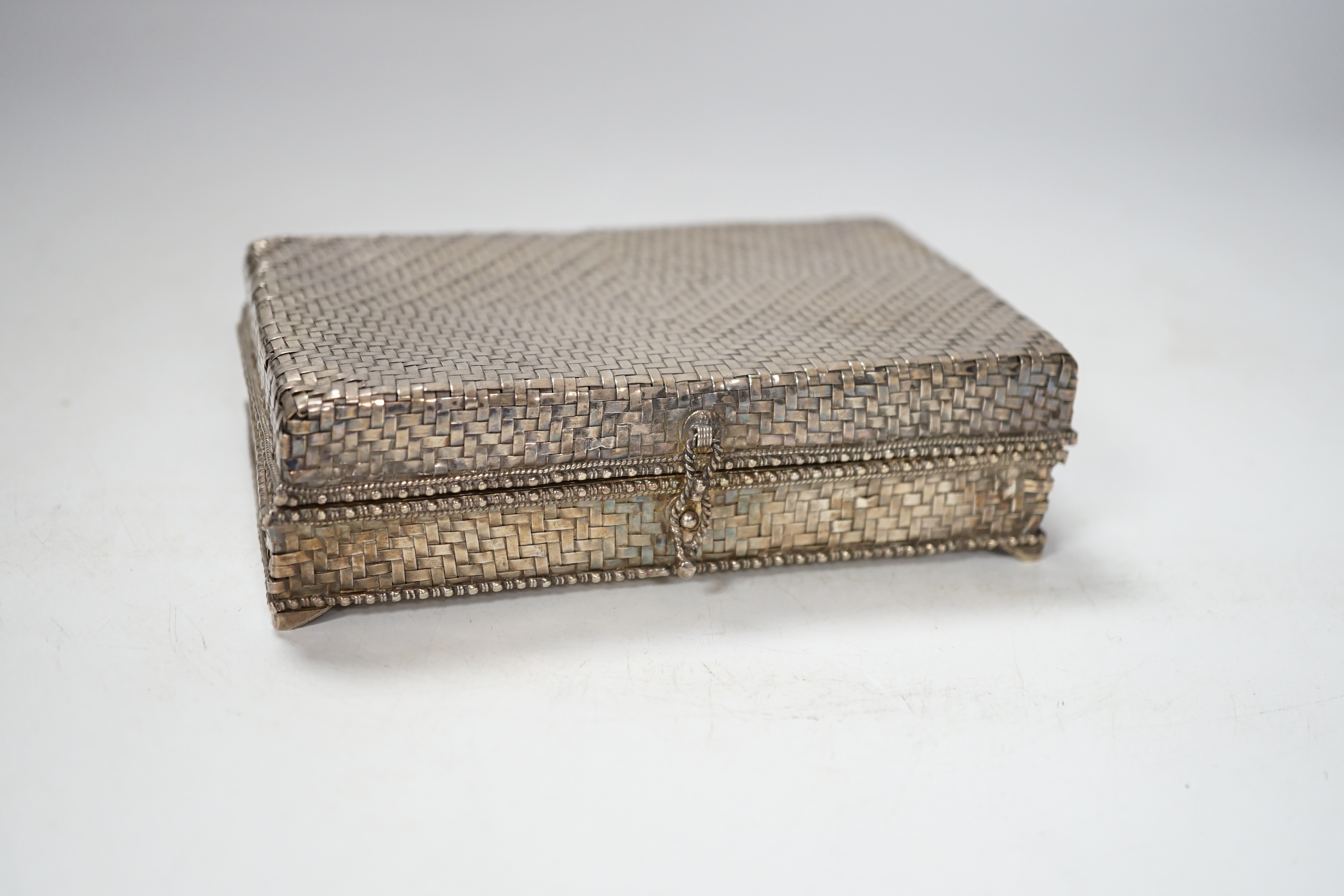 An Asian woven white metal casket, 12.5cm